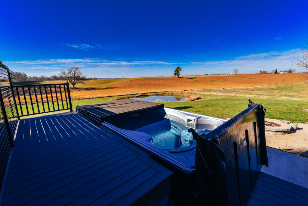 swimlife swim spa with cover and scenic background