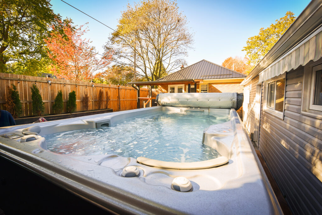 Swim spa with cover in autumn